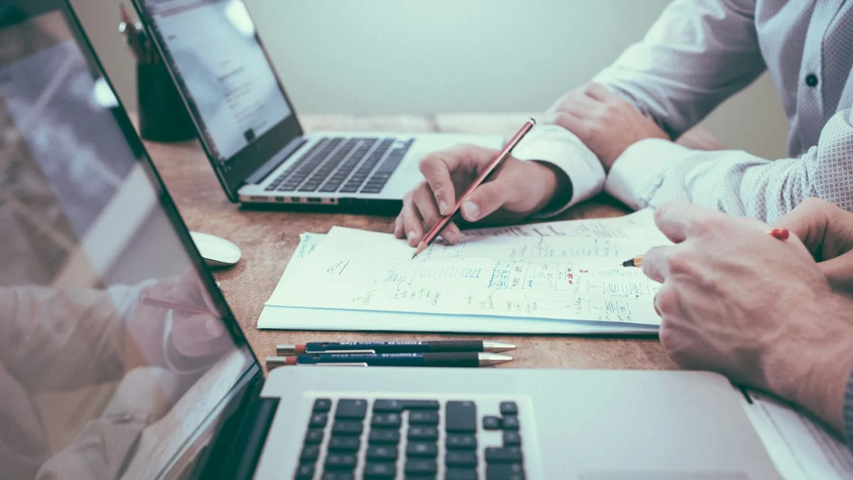 Business planning and document review at a desk