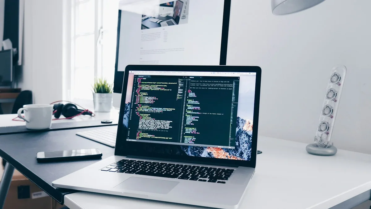 Laptop and desk used for website development