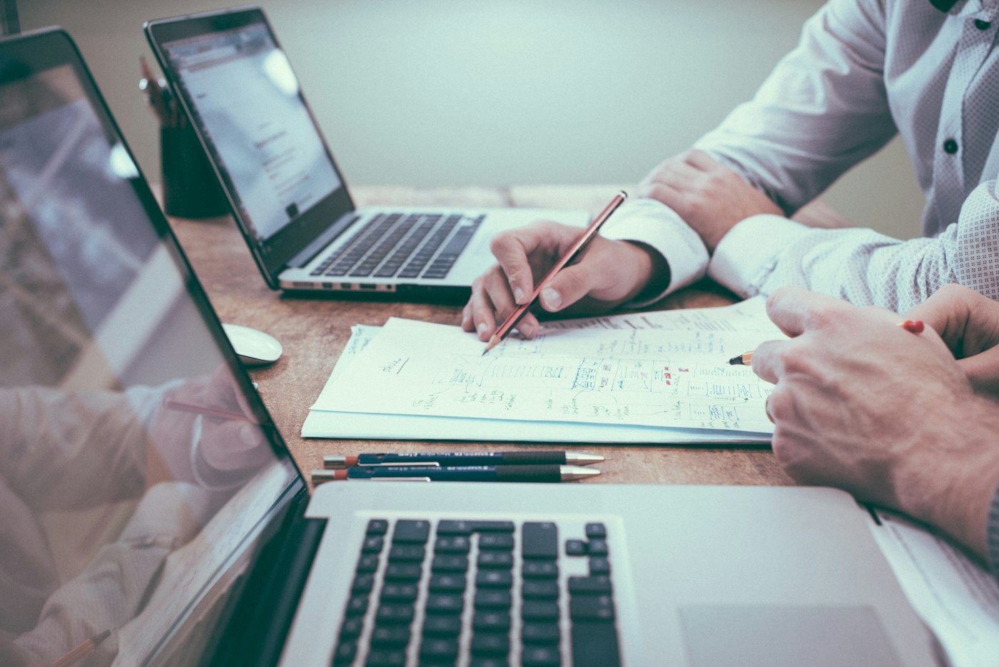 Professionals reviewing business documents