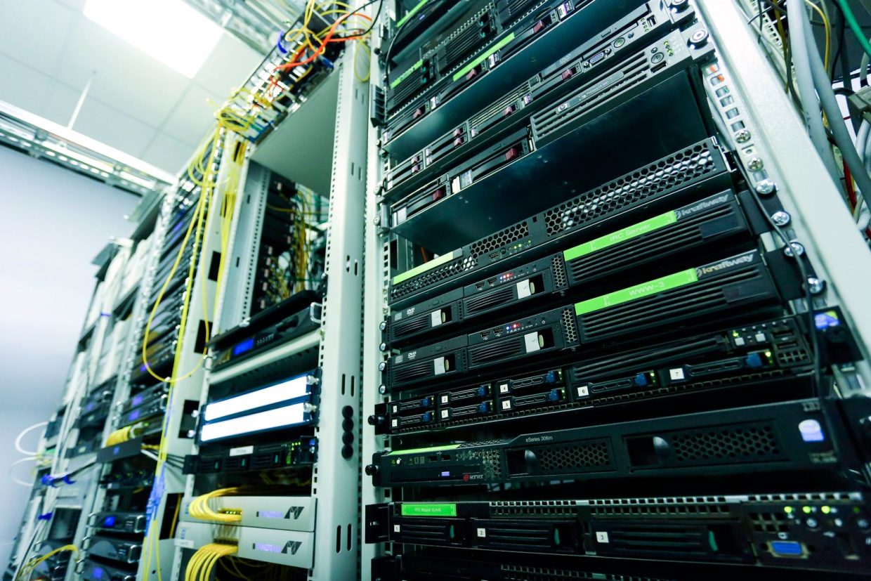 Server racks with network equipment and connected cables
